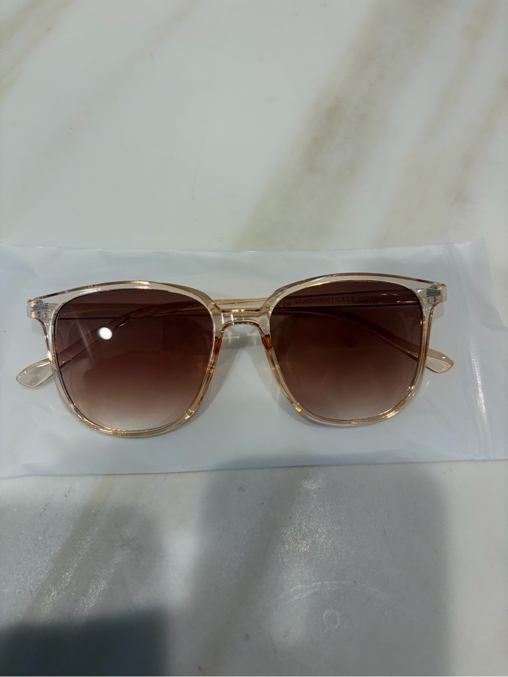 Women’s Transparent Blush Frame Sunglasses with Brown Gradient Lenses